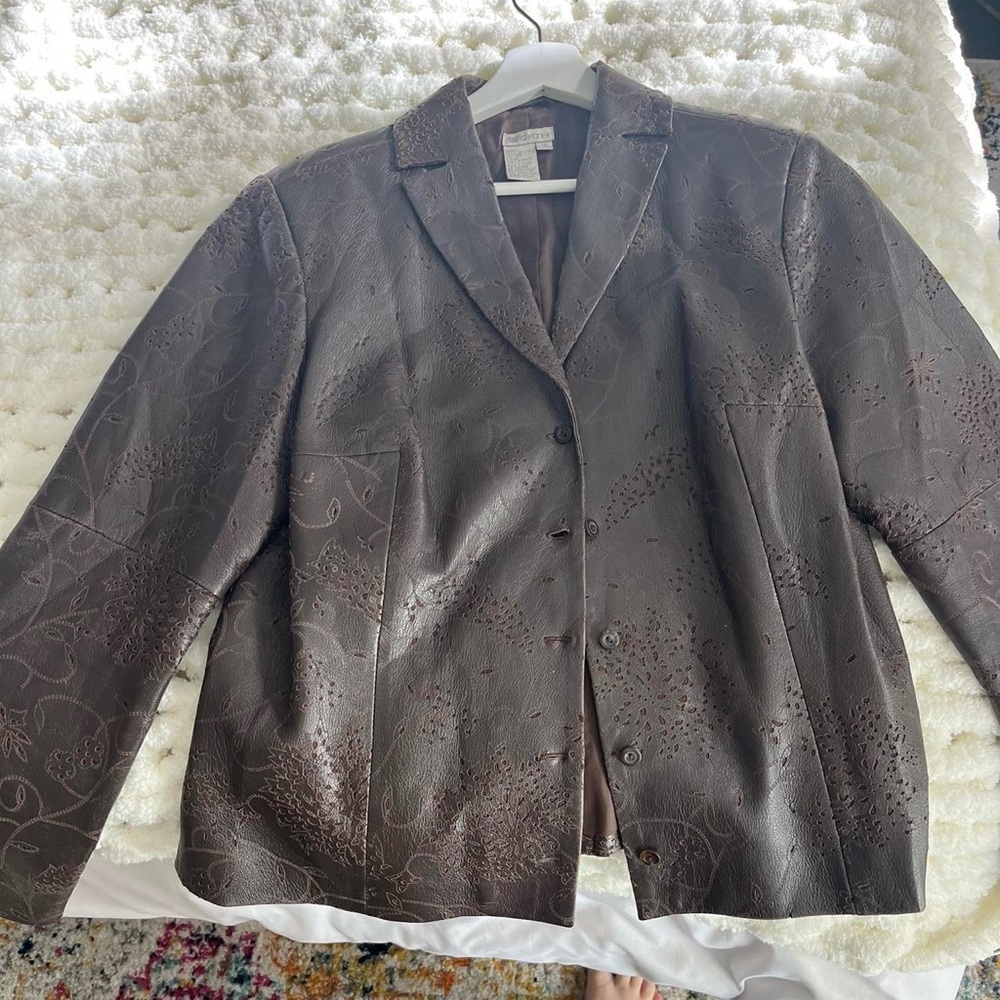 Brown leather blazer.